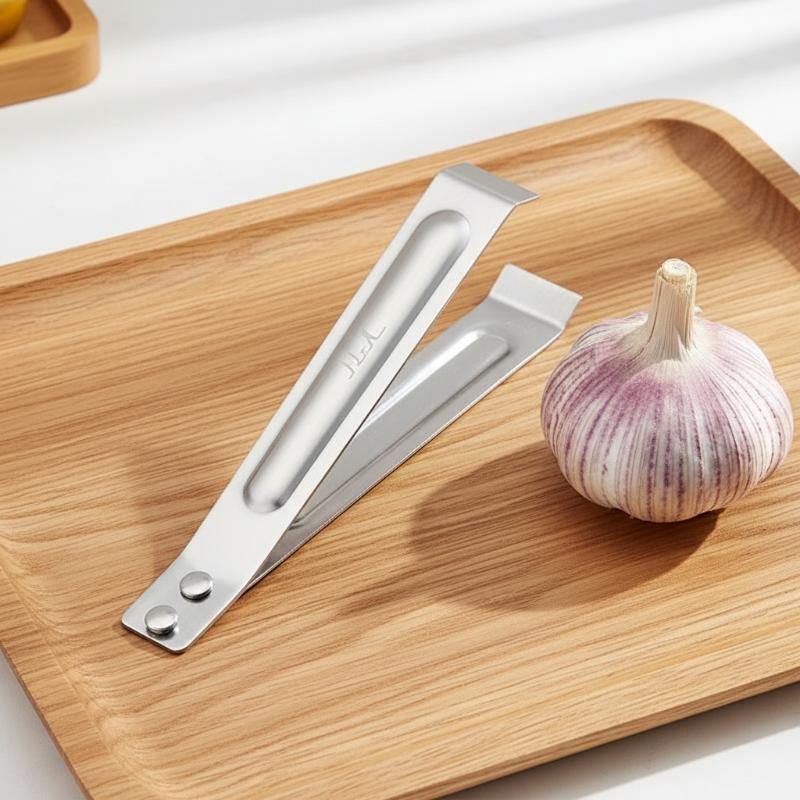 Home Cooking In - Klips do obierania czosnku ze stali